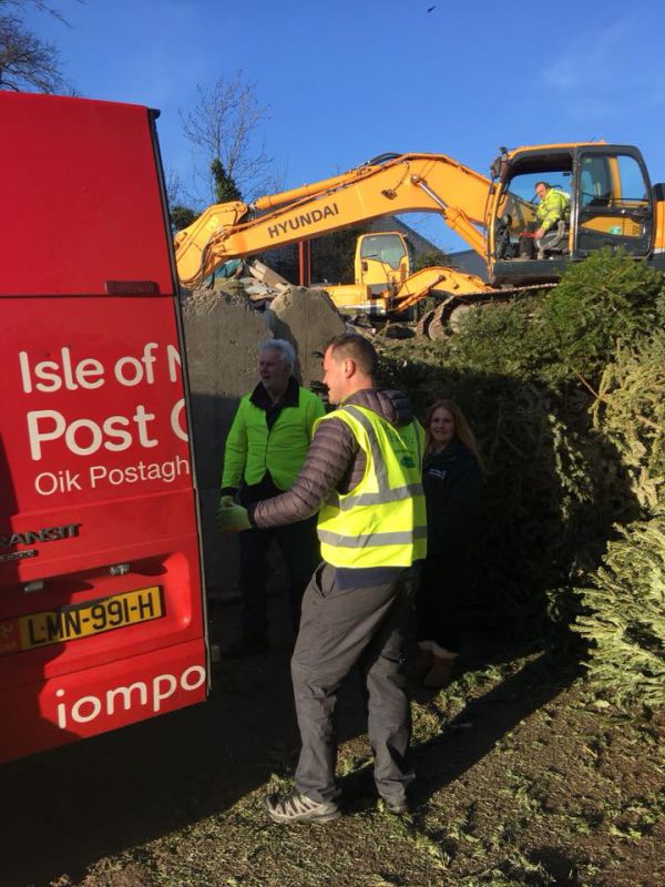 Volunteers from IOM Post Office hard at work