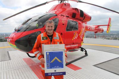 London Air Ambulance Medical Director presented with Freemasonry stamp and £1500 donation
