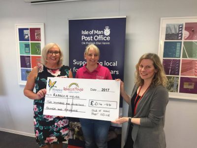 Isle of Man Post Office staff help raise £214 to support Rebecca House