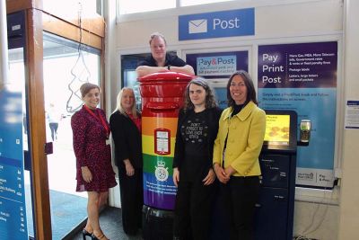 Isle of Man Post Office stands with Isle of Pride